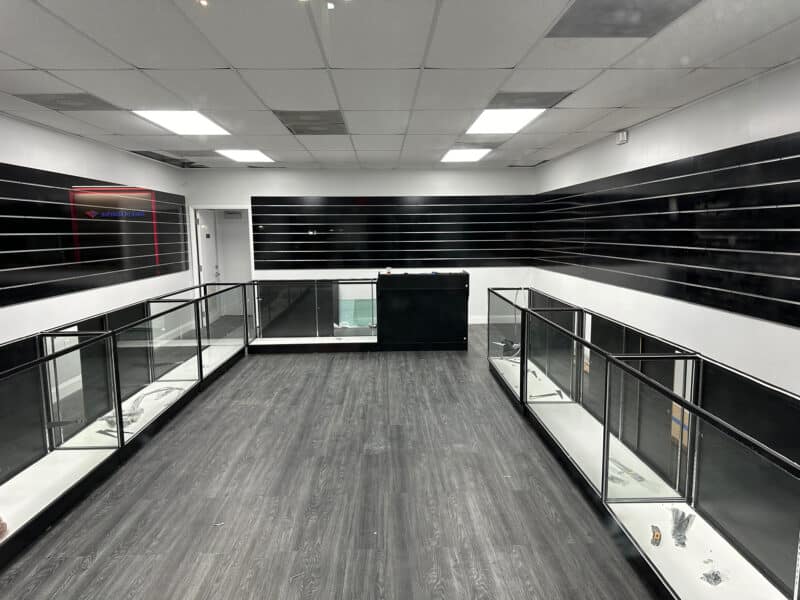 Gloss Black Slatwall Panels with Aluminum Inserts in a Retail Store