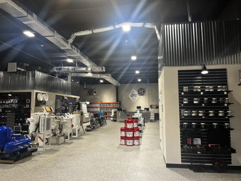 Matte Black Slatwall Panels Holding Product in a Large Retail Store