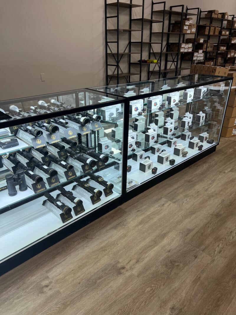 70 Inch Black Extra Vision Display Cases in a Gun Store